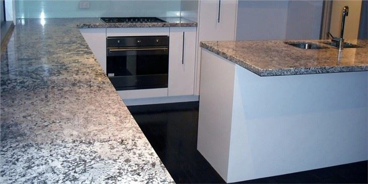 antique white cabinets with granite countertops
